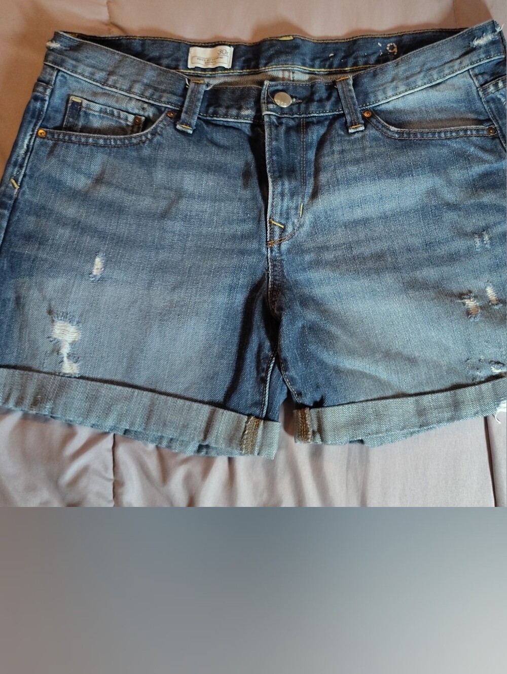 GAP Distressed Rolled Hem Denim Shorts in Medium Blue